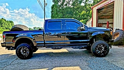 Lifted truck with custom wheels